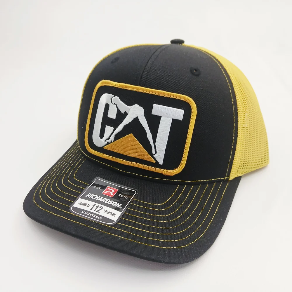 CAT Black and Yellow Richardso 112 Snap Back Trucker Hat